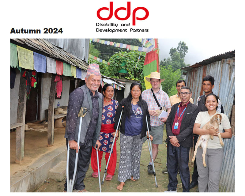 Newsletter cover image shows a visit by the team from DWA, DHRC and DDP to livelihoods participants in rural Nepal